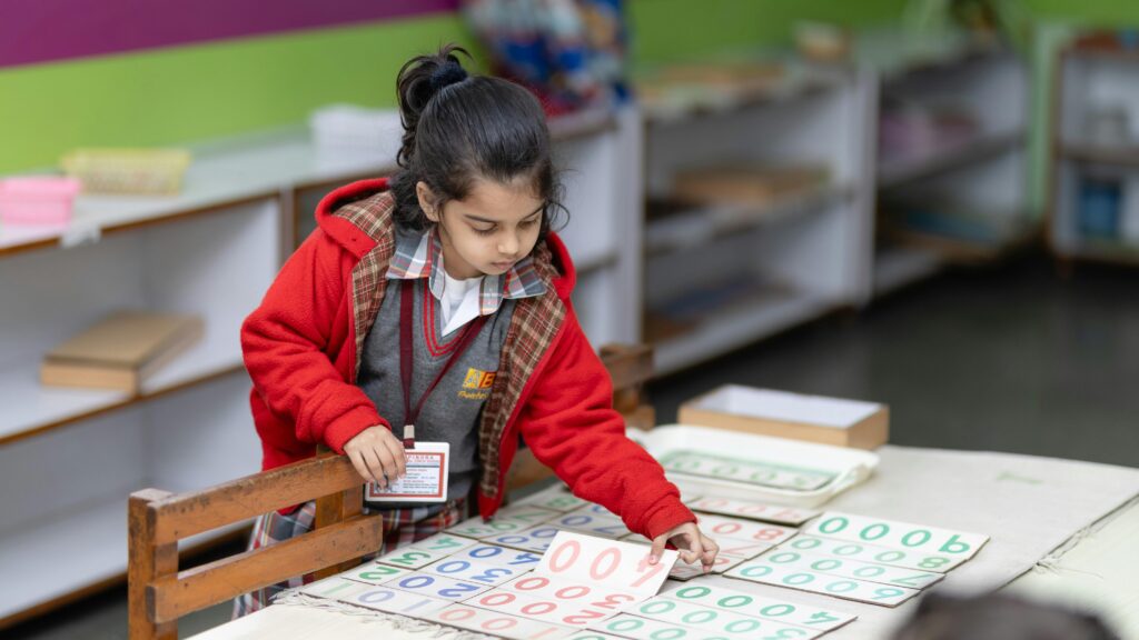 Play School Daily Routine with a child focused on learning and classroom activities in an early education setting