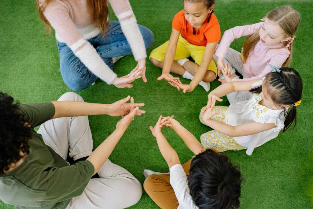 children developing social skills in kids through group activity and teamwork in early childhood education